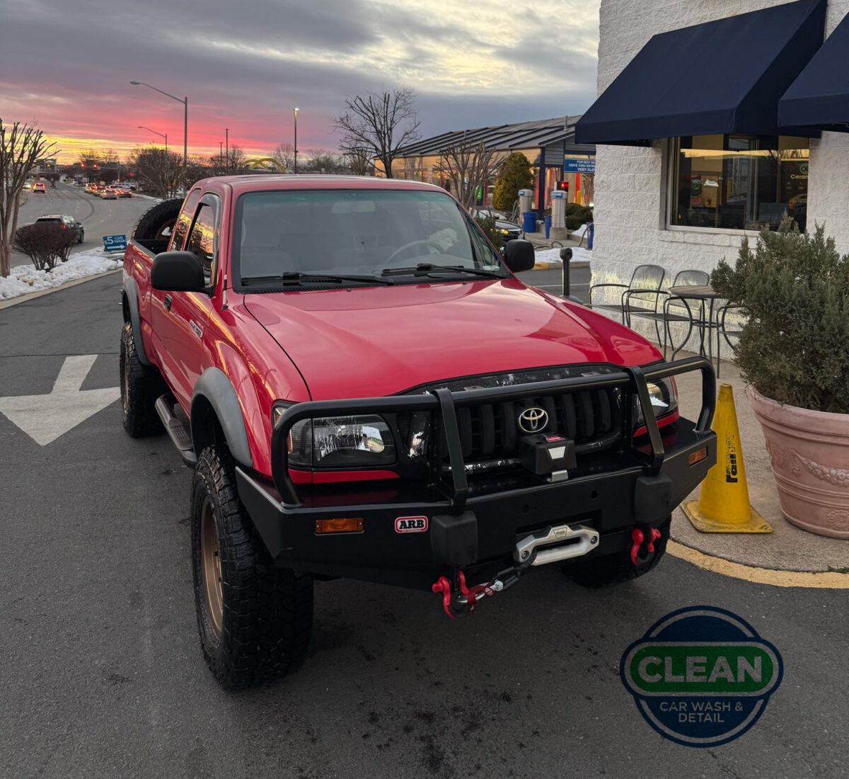 A red truck that just received car detailing services at Clean Car Wash and Detail in Fredericksburg, VA.